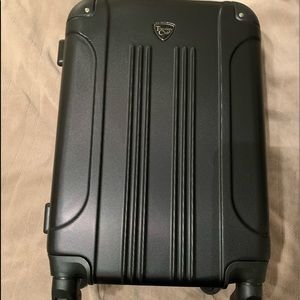 New Travelers Club 20” Hardshell Expandable Suitcase